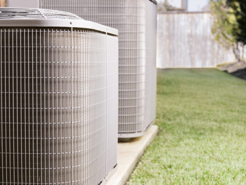 High efficiency air conditioners outside home